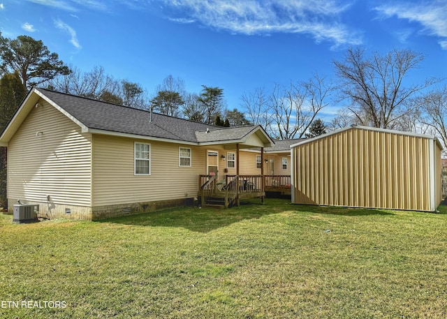 rear view of property with roof with shingles, crawl space, a yard, a wooden deck, and central air condition unit