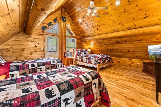 bedroom featuring wooden walls, wooden ceiling, vaulted ceiling with beams, and light wood-style floors