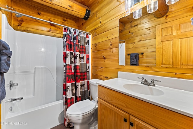 bathroom featuring shower / tub combo, toilet, vanity, and wooden walls