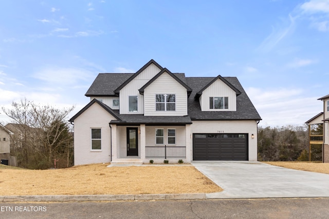 modern inspired farmhouse featuring roof with shingles, a porch, an attached garage, concrete driveway, and brick siding