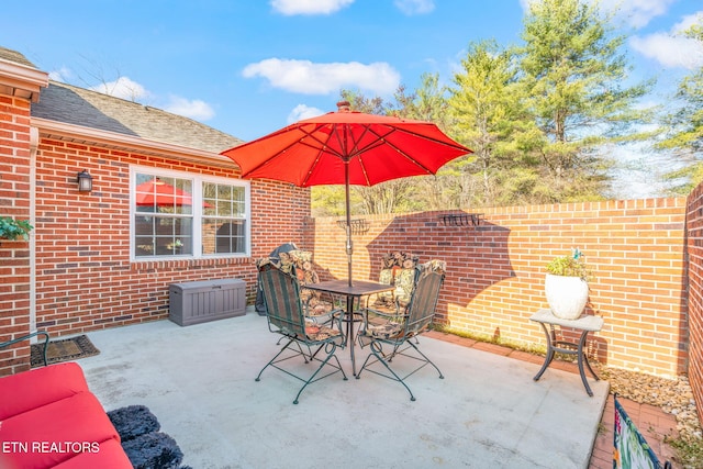 view of patio featuring outdoor dining space