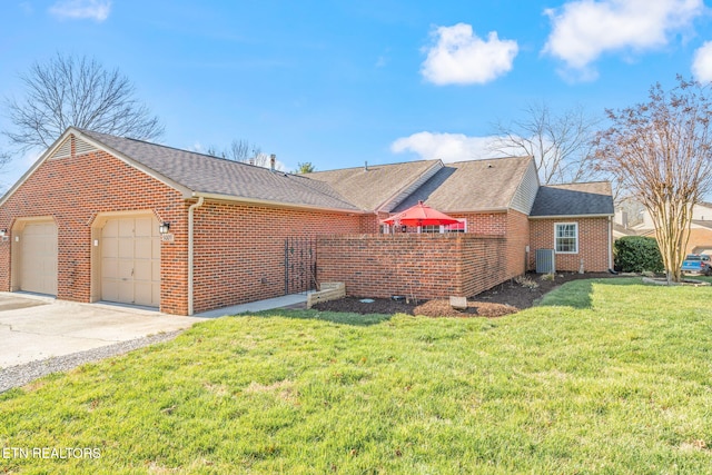 view of side of home featuring brick siding, a lawn, central AC, and roof with shingles