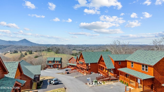 exterior space featuring a residential view and a mountain view