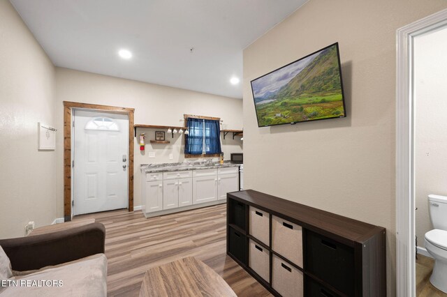 interior space with recessed lighting and light wood-style floors
