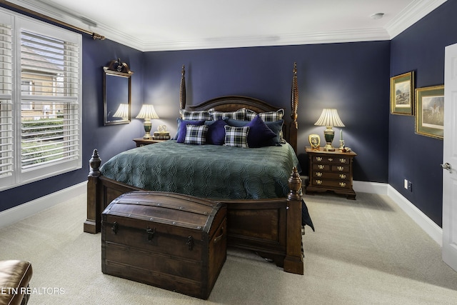 bedroom featuring crown molding, carpet, and baseboards