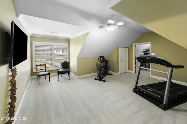 workout area with lofted ceiling, ornamental molding, a ceiling fan, carpet floors, and baseboards