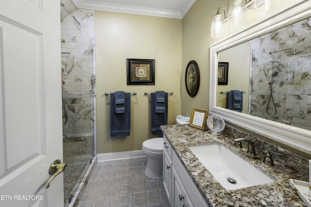 bathroom featuring vanity, baseboards, a stall shower, ornamental molding, and toilet