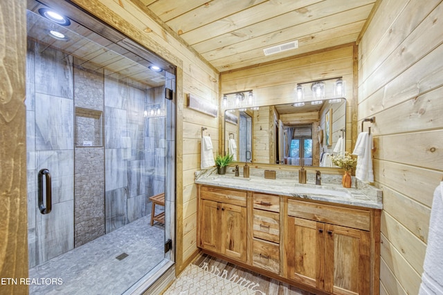 full bathroom with wooden ceiling, a stall shower, wooden walls, and a sink