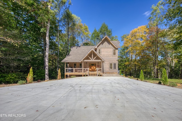 chalet / cabin with a porch