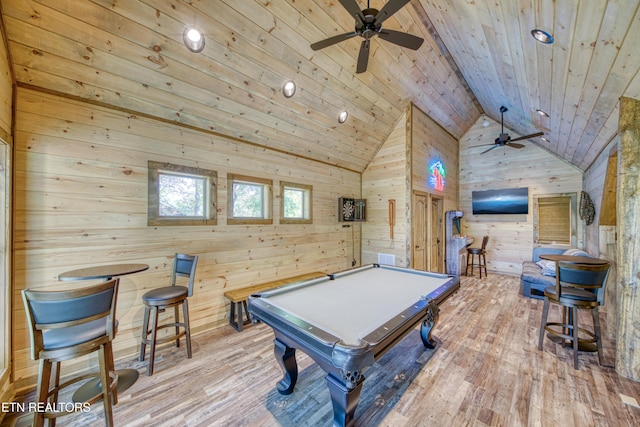 rec room featuring billiards, wood ceiling, wood finished floors, wood walls, and high vaulted ceiling