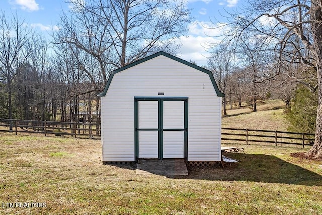 view of shed featuring a fenced backyard