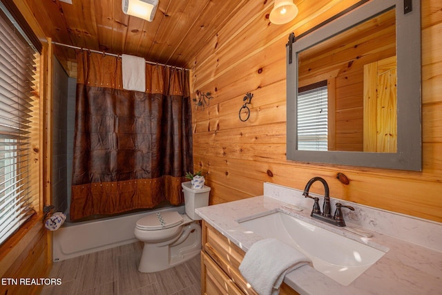 bathroom with toilet, shower / bath combo, wood ceiling, wood walls, and vanity