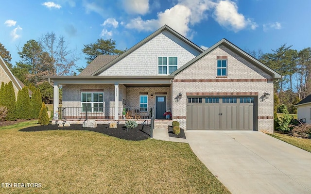 craftsman-style house featuring concrete driveway, a porch, a front yard, and brick siding