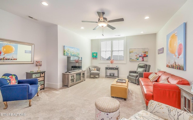 living area featuring carpet, recessed lighting, visible vents, a ceiling fan, and baseboards