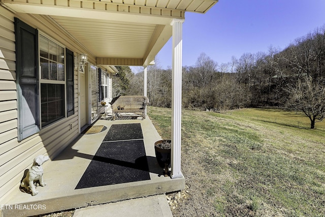 view of patio featuring covered porch