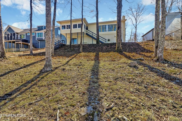 view of yard featuring stairway