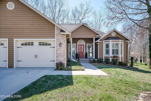 ranch-style home with a front yard, driveway, an attached garage, a shingled roof, and brick siding