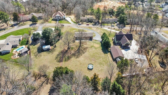 birds eye view of property with a residential view