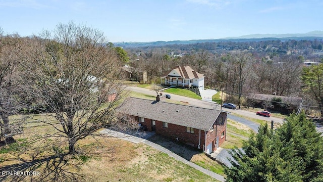 bird's eye view featuring a view of trees