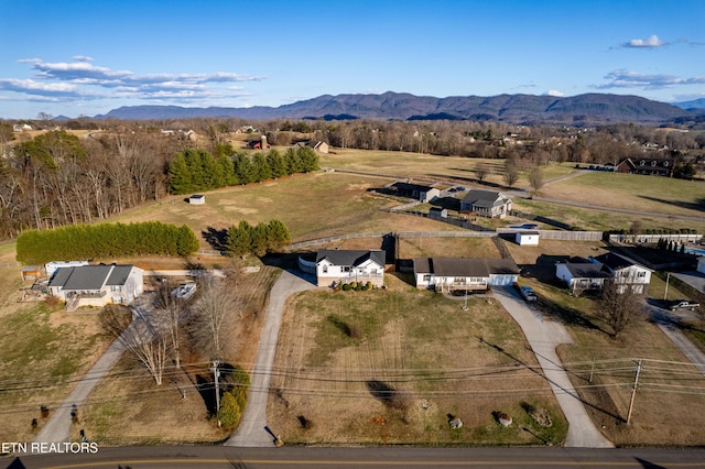 bird's eye view featuring a rural view and a mountain view