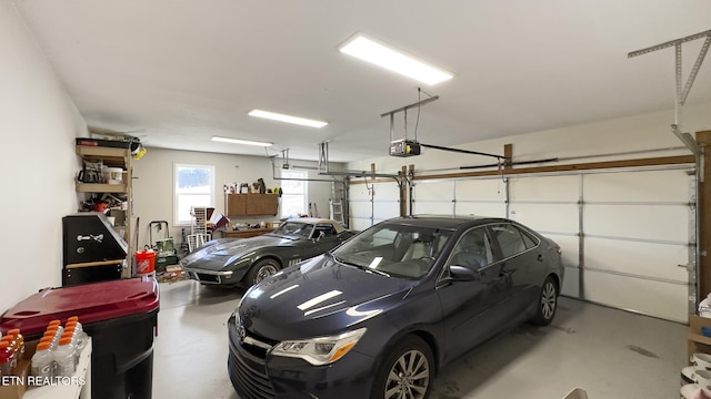 garage featuring a garage door opener