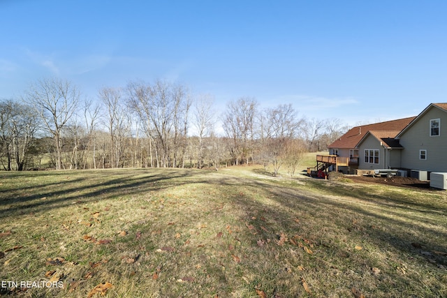 view of yard featuring a wooden deck