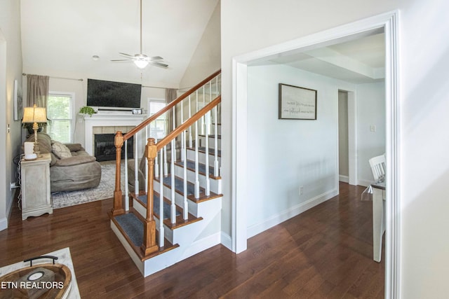 103 Branch Ln, Clinton, TN 37716 - stairs with a fireplace, ceiling fan, wood finished floors, and vaulted ceiling