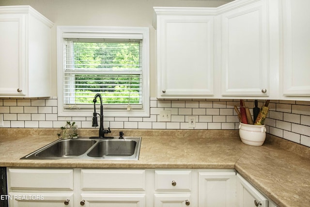 103 Branch Ln, Clinton, TN 37716 - kitchen featuring white cabinetry, decorative backsplash, and light countertops