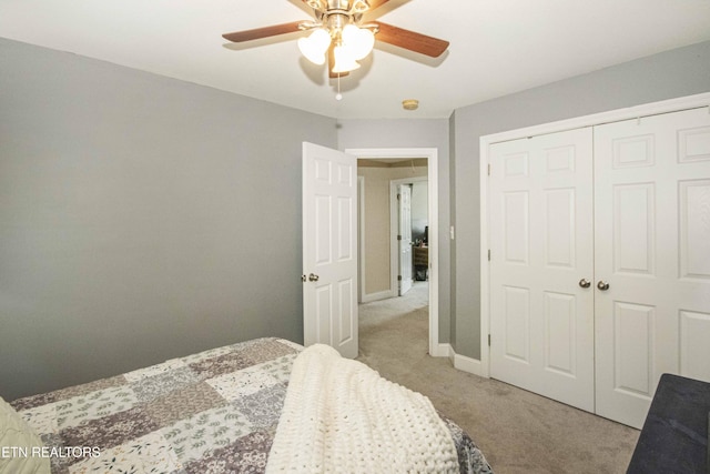 103 Branch Ln, Clinton, TN 37716 - bedroom with light colored carpet, a closet, and a ceiling fan