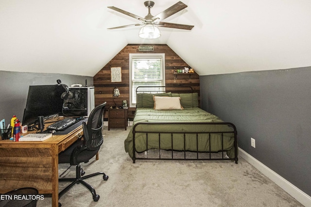 103 Branch Ln, Clinton, TN 37716 - carpeted bedroom with a desk, wooden walls, lofted ceiling, and a ceiling fan