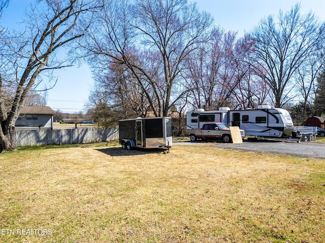 view of yard with fence