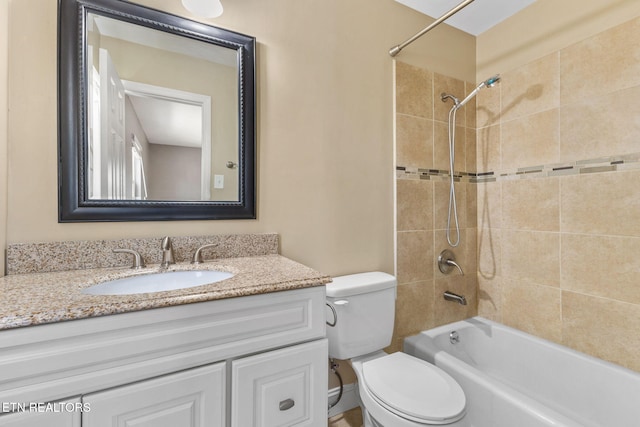 full bath featuring toilet, shower / washtub combination, and vanity