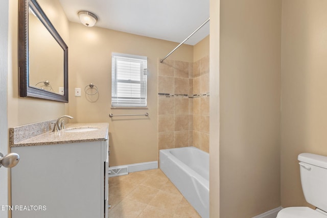 bathroom featuring visible vents, toilet, tile patterned flooring, baseboards, and vanity