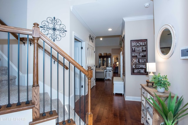 entrance foyer featuring ornamental molding, stairs, baseboards, and wood finished floors