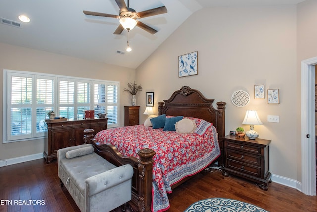 bedroom with dark wood-style floors, lofted ceiling, visible vents, and baseboards