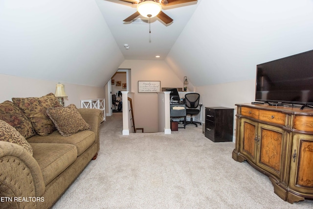 living room with light carpet, ceiling fan, and vaulted ceiling