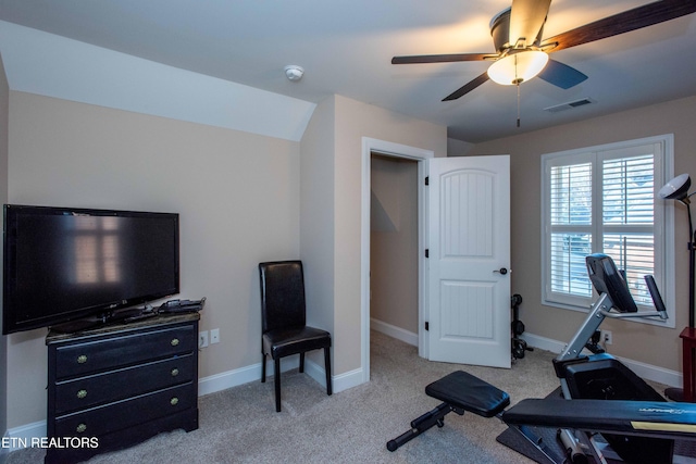 exercise area featuring ceiling fan, carpet, visible vents, and baseboards