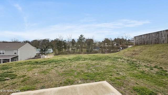 view of yard with fence