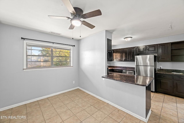 kitchen with visible vents, appliances with stainless steel finishes, a peninsula, open shelves, and light tile patterned flooring