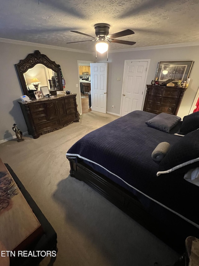 bedroom featuring ornamental molding, light carpet, a textured ceiling, and a ceiling fan