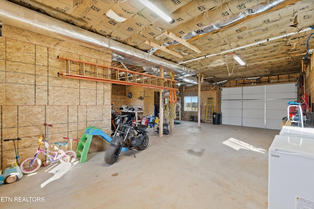 garage featuring washer / clothes dryer