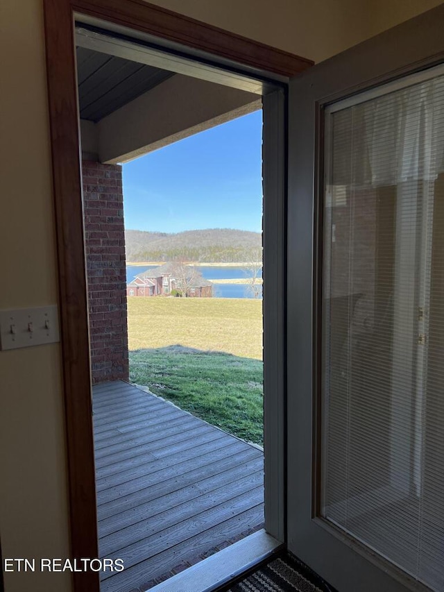 entryway featuring a water view