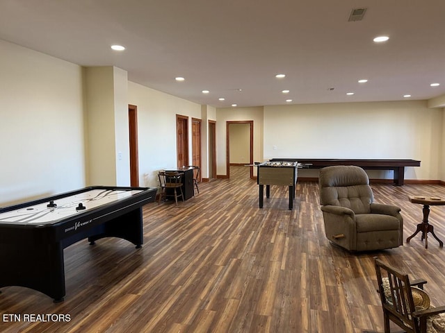 recreation room featuring recessed lighting, visible vents, baseboards, and wood finished floors