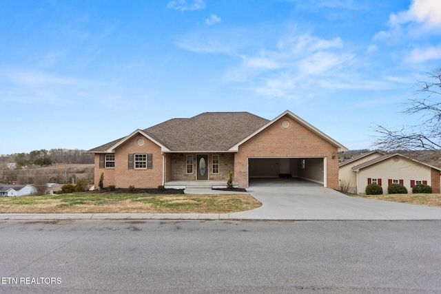 ranch-style home with a garage, concrete driveway, brick siding, and a shingled roof