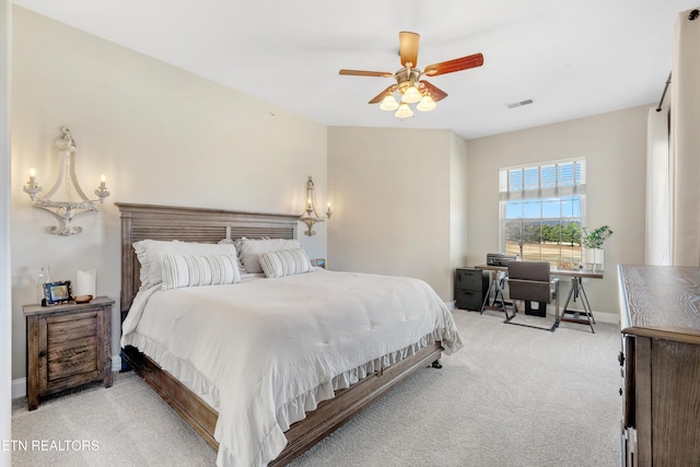 bedroom with ceiling fan, carpet floors, visible vents, and baseboards