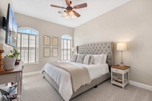 bedroom with carpet, visible vents, ceiling fan, and baseboards