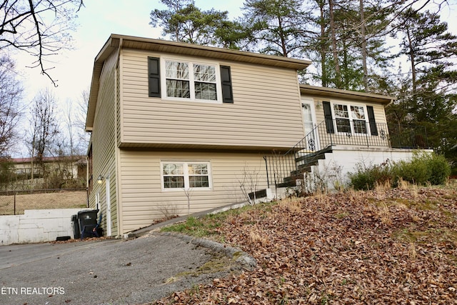 view of front of home featuring stairs