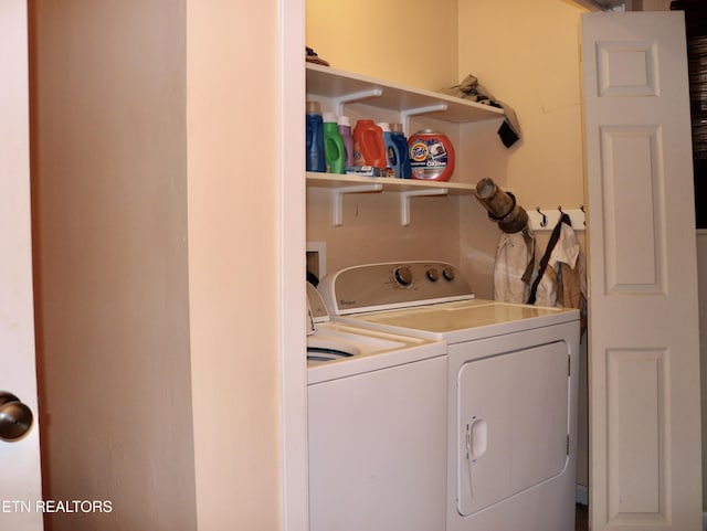 laundry area featuring laundry area and separate washer and dryer