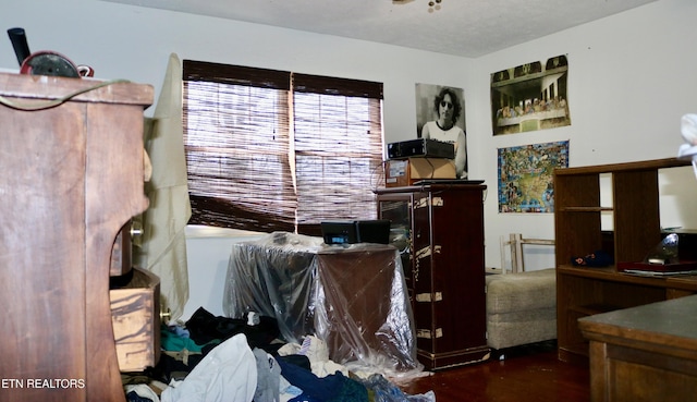 miscellaneous room featuring wood finished floors