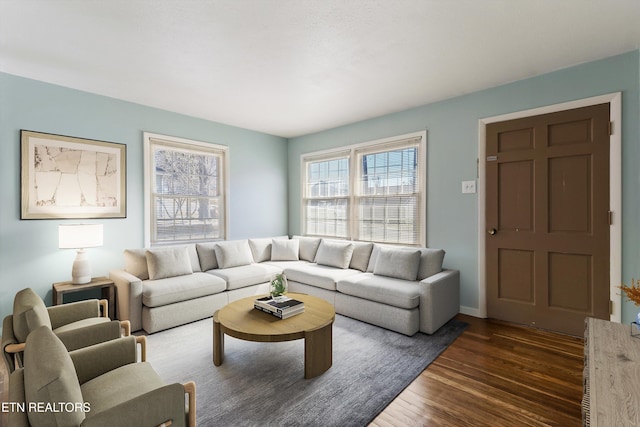 living area with dark wood finished floors